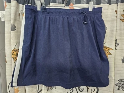 Pantalón corto deportivo para mujer grande (12/14) azul oscuro con bolsillos con cremallera de Danskin Now Foto 1 de 4