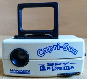Capri Sonne Spion Kamera winzig 80er KLEINE Fotos trinken Kinder Lunchpaket Schule Hanime - Bild 1 von 5