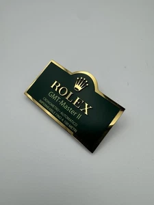 Placa de exhibición Rolex semicírculo corona GMT Master II 16710 italiana 64 mm x 40 mm - Imagen 1 de 3