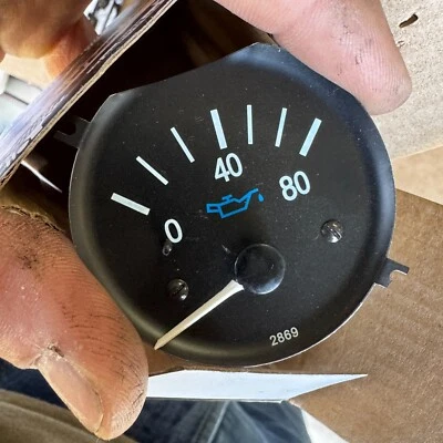 Omix-Ada 17210.16 Engine Oil Pressure Gauge Black/White for 87-91 Jeep Wrangler - Image 1 of 3