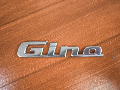 GINO REAR TAIL GATE EMBLEM BADGE FIT DAIHATSU MIRA GINO L700 OEM - Image 1 of 4