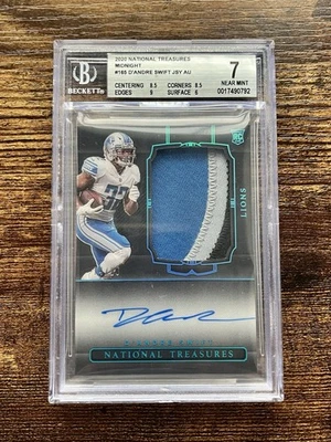D'ANDRE SWIFT 2020 NATIONAL TREASURES MIDNIGHT PATCH AUTO /20 BGS 7 BEARS - Image 1 of 2