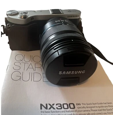 Cámara digital inteligente Samsung NX300 20,3 MP WiFi con lente de 20-50 mm y estuche personalizado Foto 1 de 4