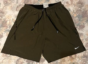 Pantalones Cortos Nike Dri-FIT Para Hombre Medianos – Verde Oliva, Bolsillos con Cremallera, Ropa Deportiva Cordón - Imagen 1 de 9