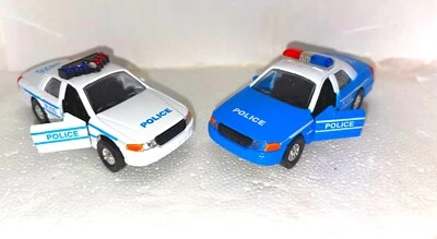 2 PACK - NYC  Police  Car 1/43 diecast w/ Pull Back Motor Action White & Blue - Image 1 of 2