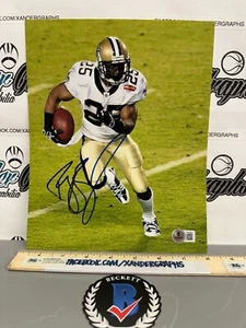 REGGIE BUSH SIGNED AUTOGRAPHED 8X10 NFL FOOTBALL PHOTOGRAPH-BECKETT BAS COA - Picture 1 of 4