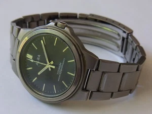 SEIKO ALBA TITANIUM V501-0DN0 10 BAR WASSERDICHT HERREN FUNKTIONSFÄHIG NEUER AKKU - Bild 1 von 13