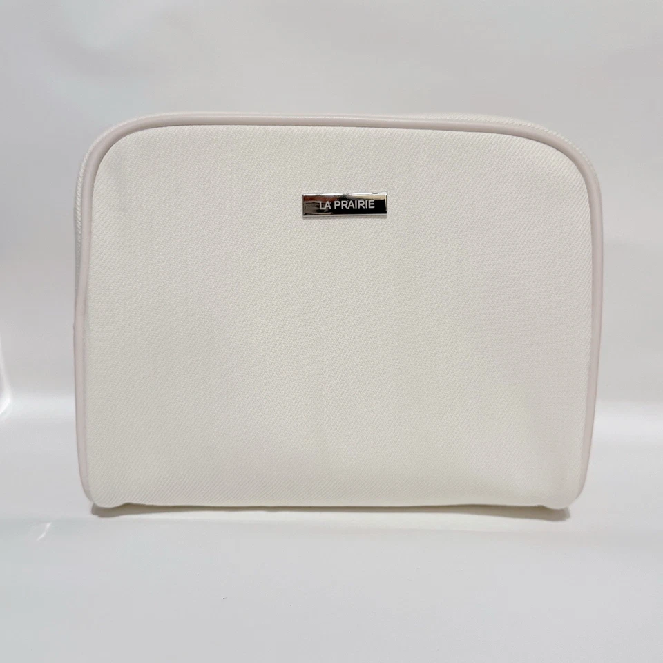 全新 La Prairie 白色化妆品化妆拉链手拿包 旅行袋 — 第 1/1 张图片