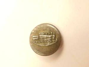 old silver colored pressed tin metal button showing an old train /locomotive - Picture 1 of 6