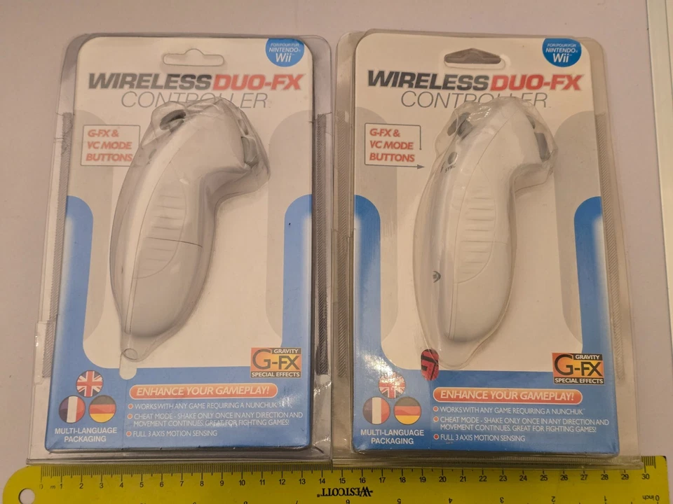 2 x NINTENDO Wii WIRELESS DUO FX NUNCHUK White Cheat Controller Nunchuck Datel U - Image 1 of 4