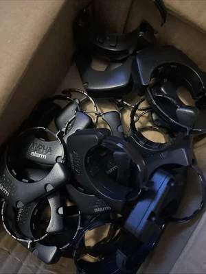 Lote de 25 envolturas de seguridad para botella de agarre de acero Alpha Alarm para detergente para vino Foto 1 de 4