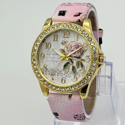 Reloj de cuarzo para mujer tono dorado rosa esfera floral, detalles de cristal, correa rosa 42 mm Foto 1 de 4