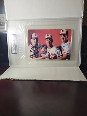 🏷  Cal Ripken Sr, Jr, & Billy, Autographed Promo Flyer PSA/DNA Authentic Autos - Image 1 of 3