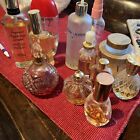 Vintage Perfume Bottles In Ceramic Pot