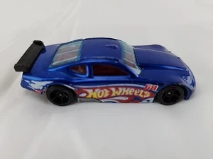 2010 HOT WHEELS CIRCLE TRACKER #68 BLUE 1:64 DIECAST 2 7/8" RACE CAR W RED WHITE - Picture 1 of 5