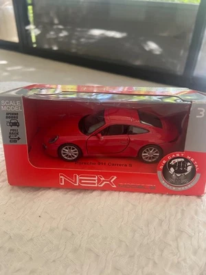 Welly Nex Porsche 911 Carrera S -- 1:32 Scale red Model Car Pull Back and Go - Image 1 of 2