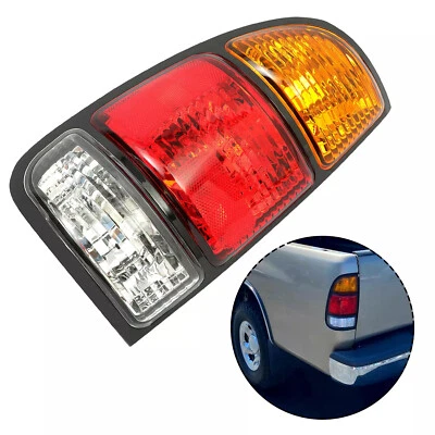 Задний фонарь в сборе со стороны водителя левый с лампочками для Toyota Tundra 2000-2006 - Изображение 1 из 4