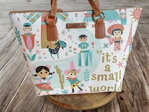 Neu mit Etikett Disney Parks Dooney & Burke It’s A Small World Beuteltasche Tasche Handtasche 2024 - Bild 1 von 3