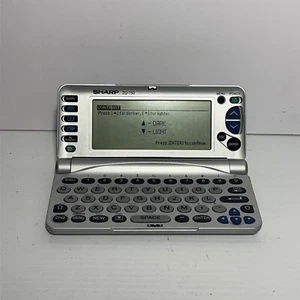 Rare Sharp ZQ 750 Handheld Organizer Vintage Tested & Working - Picture 1 of 6