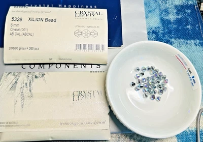 Swarovski 5328 6 mm Cristal AB CAL Cuentas Bicónicas Austriacas Paquete de 360 piezas Sello Foto 1 de 4