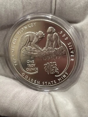 Año del Mono 2016 sin circular Troy .999 plata fina redonda en cápsula 1 oz Foto 1 de 2