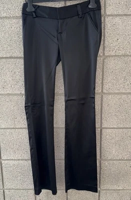 Pantalones acampanados Alice + Olivia negros satinados tiro bajo talla 4 Foto 1 de 4