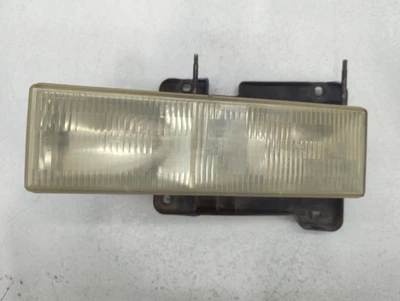 Faro delantero izquierdo conductor Chevrolet C2500 OEM lámpara ATUXU Foto 1 de 4