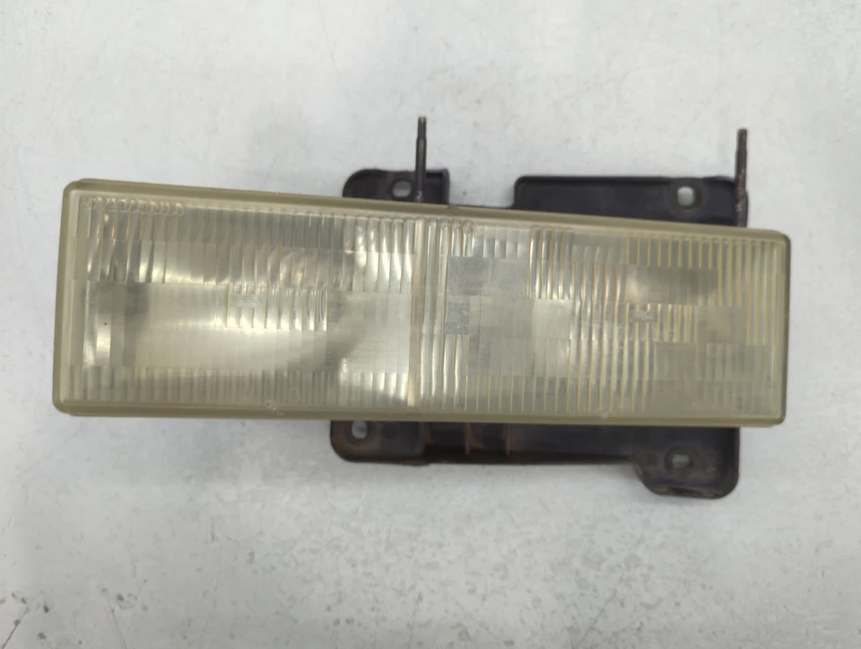 Faro delantero izquierdo conductor Chevrolet C2500 OEM lámpara ATUXU Foto 1 de 4