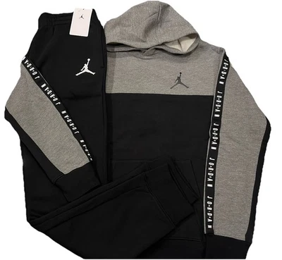 NUEVO CON ETIQUETAS NIKE AIR JORDAN NIÑO CONJUNTO DE 2 PIEZAS SUDADERA CON CAPUCHA Y PANTALONES DEPORTIVOS GRIS NEGRO XL (13-15) Foto 1 de 3