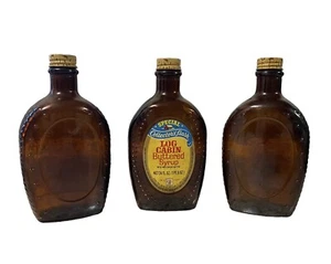 3 Vintage Log Cabin Syrup Brown Glass Embossed Bottles w/ Lid Dated 1776 - Picture 1 of 10