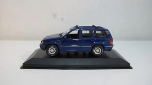 1:43 MINICHAMPS (MAXICHAMPS) 1995 JEEP GRAND CHEROKEE BLUE DIECAST CARS - Picture 1 of 6