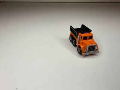 ВИНТАЖНЫЙ 1987 Micro Machines Самосвал Оранжевый Черный Galoob Конструкция - Изображение 1 из 4