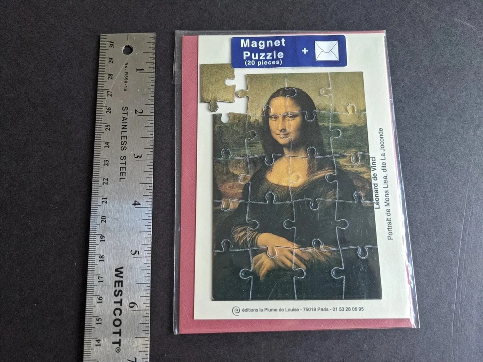 Vintage France souvenir Mona Lisa Art Leonardo da Vinci Magnet Puzzle 20 pieces - Image 1 of 4