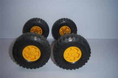 Nylint 4 Tires With Axles Orange Hubs 1970's 3 1/8 " High x 1 1/8 " Wide - Image 1 of 4