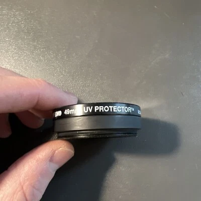 Tiffen 49mm UV Protector Filter Plus Adapter Ring? - Image 1 of 4