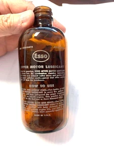 VINTAGE ESSO UPPER MOTOR LUBRICANT BOTTLE PAPPER AND PAINTED LABEL - Picture 1 of 3