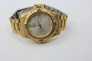 Mens Caravelle by Bulova Silver Dial Gold Stainless Watch New Battery 42b75 - Picture 1 of 6