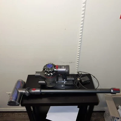 DYSON V7 ANIMAL EXTRA CORD FREE STICK VACUUM --GOOD - Image 1 of 4