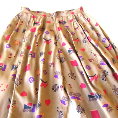 Pantalones de tiro alto abstractos coloridos M marrón cintura 28 para mujer púrpura de colección Foto 1 de 4