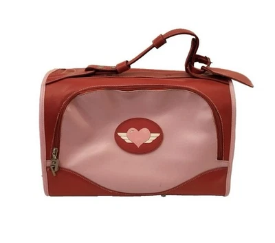 PORTADOR RETRO PARA MASCOTAS marca Pet Fly con motivo corazón alado rosa y rojo Foto 1 de 4