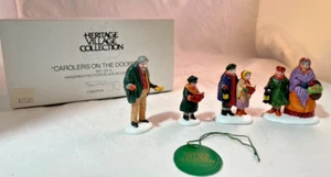 De colección. Department 56 Heritage "CAROLERS ON THE DOORSTEP" Juego de 4 #5570-0 Nuevo en caja - Imagen 1 de 7