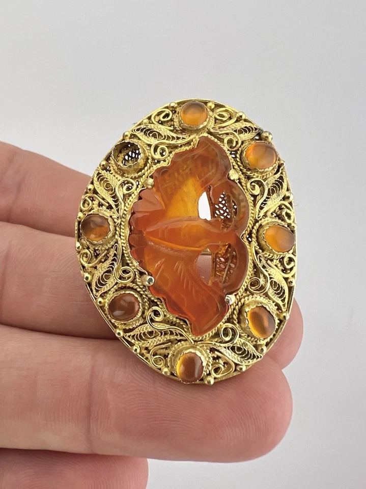 Antiguo anillo ovalado de murciélago cornalina tallada ornamentada de plata dorada de exportación china Foto 1 de 4