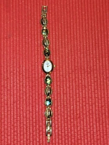 Vanity Fair Damenuhr goldfarben Multi Abalone Cabochon Muscheln Band - Bild 1 von 16