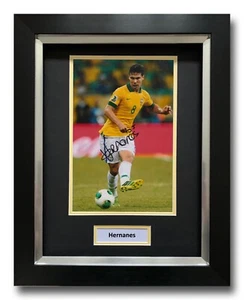 HERNANES HAND SIGNED FRAMED PHOTO DISPLAY - BRAZIL AUTOGRAPH - FOOTBALL. - Picture 1 of 1