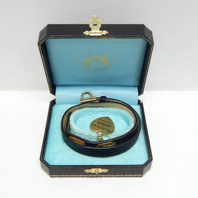 JUICY COUTURE GOLD TONE & BLACK LEATHER WRAP BRACELET WITH HEART CHARM - Image 1 of 2