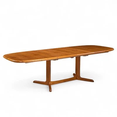 Mesa de comedor expansible de hojas ocultas de teca danesa Ansager Mobler con 2 hojas Foto 1 de 4