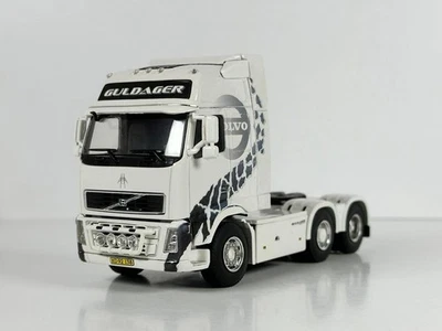 Modelos de camiones WSI, Volvo FH2 Glob. XL 6X2, GULDAGER "JAK BLACK" Foto 1 de 4