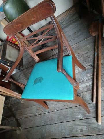 antique wooden arm chair with padded seat Cover