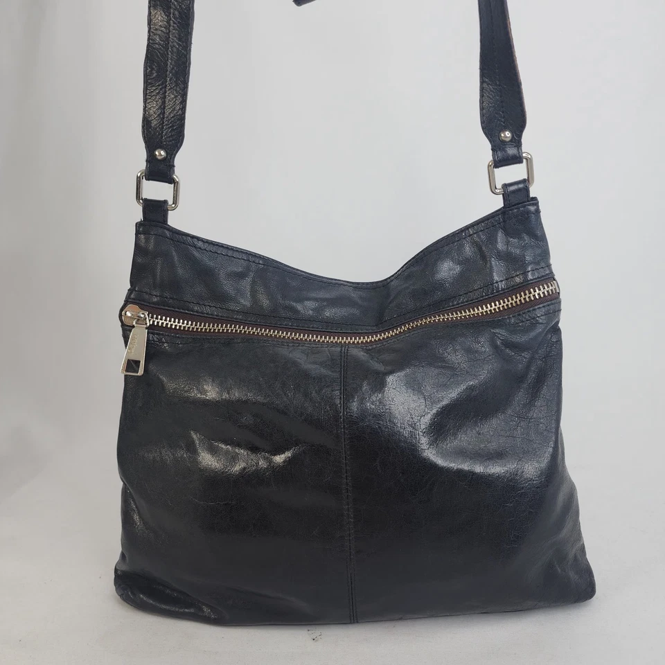 Bolso Bandolera Hobo Lorna Cuero Negro Grano Superior Frontal Cremallera Bolsillos Ajustables Foto 1 de 4