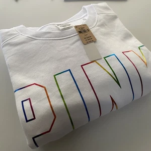 Victoria's Secret PINK Solid White Crewneck Sweatshirt Rainbow Logo Small NWT - Picture 1 of 10